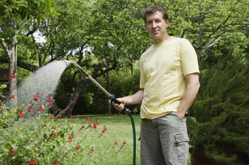 Gardeners selecting native plants for sustainable landscape design