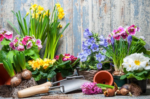 Team of gardeners working in a suburban garden